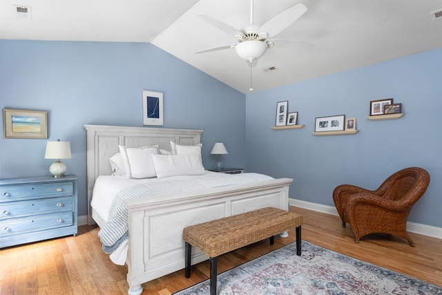 1604 Macoma Dr, Mount Pleasant, SC 29466 - bedroom featuring light wood finished floors, baseboards, vaulted ceiling, and ceiling fan