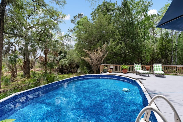 1604 Macoma Dr, Mount Pleasant, SC 29466 - outdoor pool featuring a deck and view of scattered trees