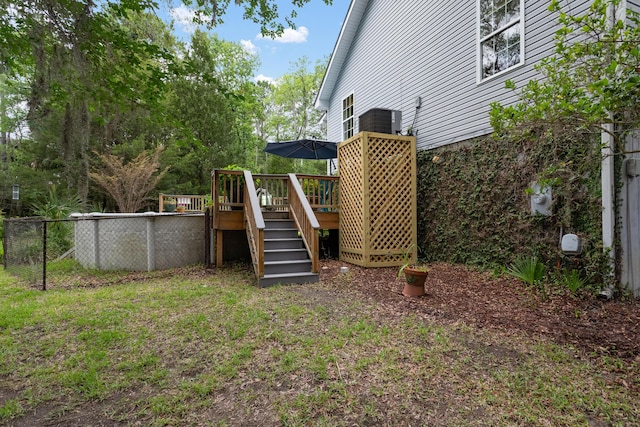 1604 Macoma Dr, Mount Pleasant, SC 29466 - view of yard featuring a wooden deck, cooling unit, and stairs