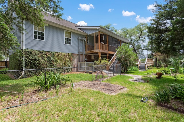 1604 Macoma Dr, Mount Pleasant, SC 29466 - back of property with stairway, a wooden deck, and a sunroom