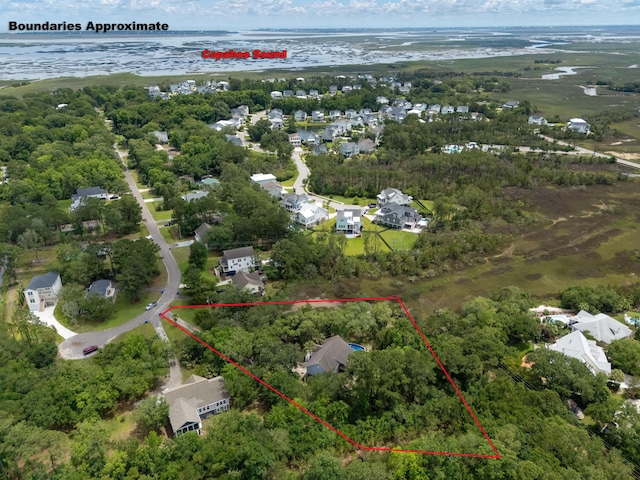 1604 Macoma Dr, Mount Pleasant, SC 29466 - aerial perspective of suburban area featuring property parcel outlined and a large body of water