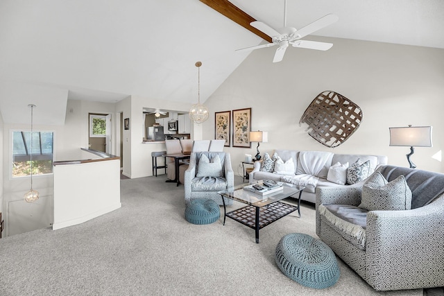 living room featuring high vaulted ceiling, carpet flooring, and ceiling fan