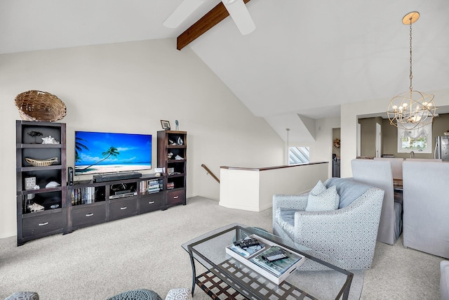 living room featuring beamed ceiling, light carpet, and plenty of natural light