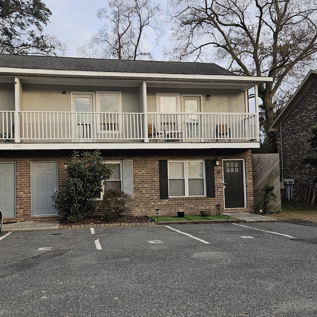 multi unit property featuring a balcony