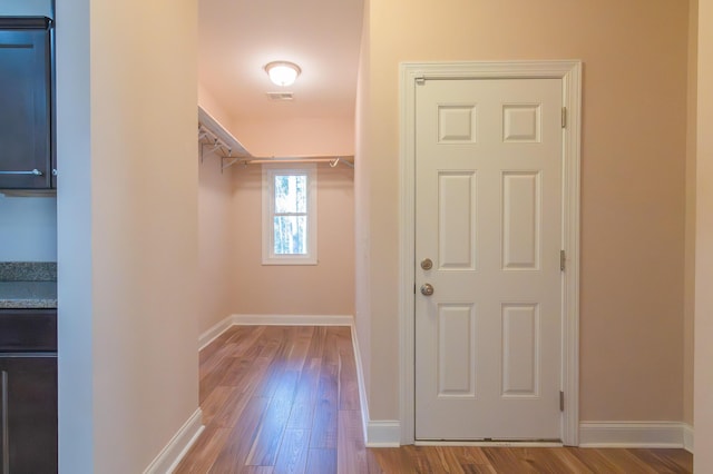 hallway featuring light hardwood / wood-style flooring