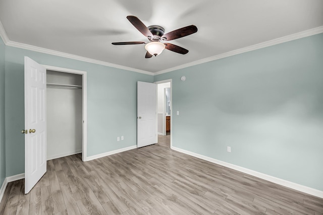 1239 Old Orchard Rd, Charleston, SC 29412 - unfurnished bedroom with a closet, light wood-style floors, baseboards, and crown molding
