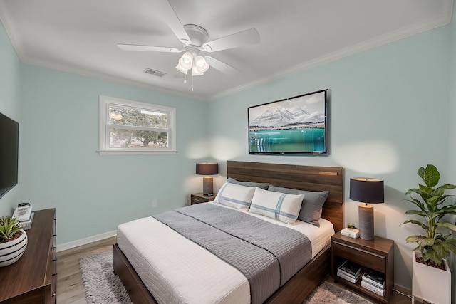 1239 Old Orchard Rd, Charleston, SC 29412 - bedroom with visible vents, baseboards, a ceiling fan, crown molding, and wood finished floors