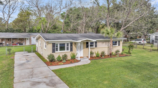 1239 Old Orchard Rd, Charleston, SC 29412 - ranch-style home with brick siding, driveway, fence, and a front lawn