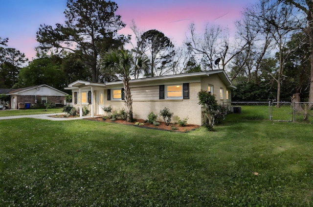 1239 Old Orchard Rd, Charleston, SC 29412 - ranch-style home with fence, a front yard, and a gate