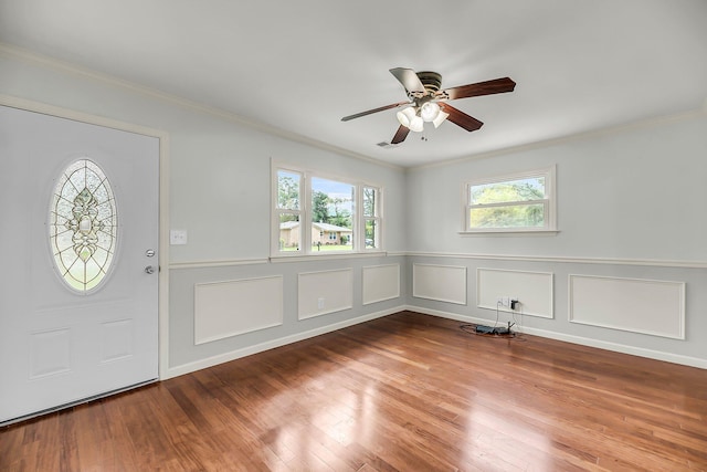 1239 Old Orchard Rd, Charleston, SC 29412 - foyer with crown molding, a wainscoted wall, a ceiling fan, and wood finished floors