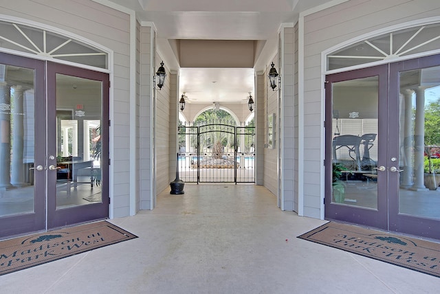 property entrance featuring french doors