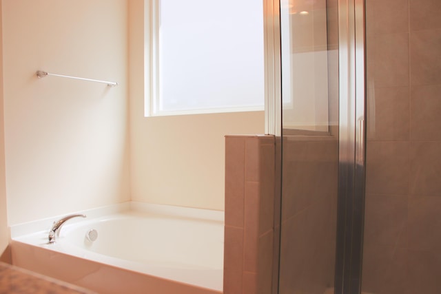 303 Citation Way, Moncks Corner, SC 29461 - bathroom featuring a bath and a shower stall