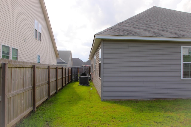 303 Citation Way, Moncks Corner, SC 29461 - view of side of home featuring a fenced backyard and roof with shingles