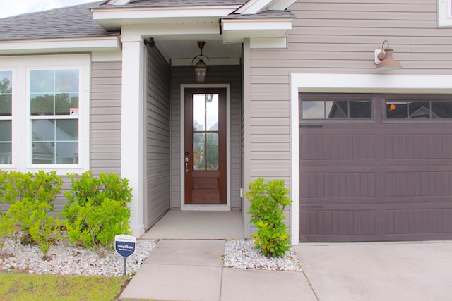 303 Citation Way, Moncks Corner, SC 29461 - doorway to property featuring a shingled roof