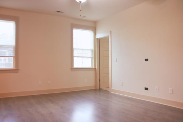 303 Citation Way, Moncks Corner, SC 29461 - empty room with wood finished floors and ceiling fan