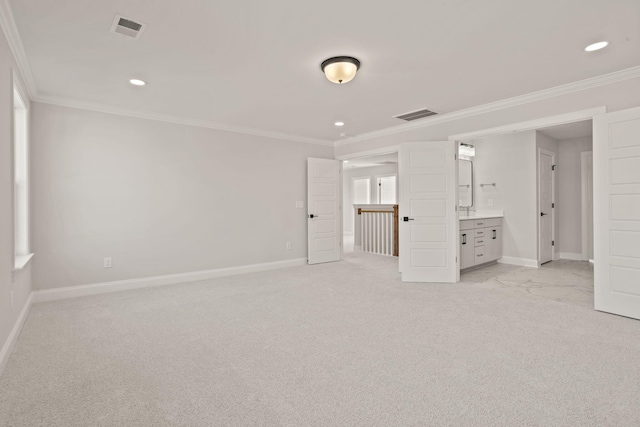 unfurnished bedroom with light carpet, baseboards, and visible vents