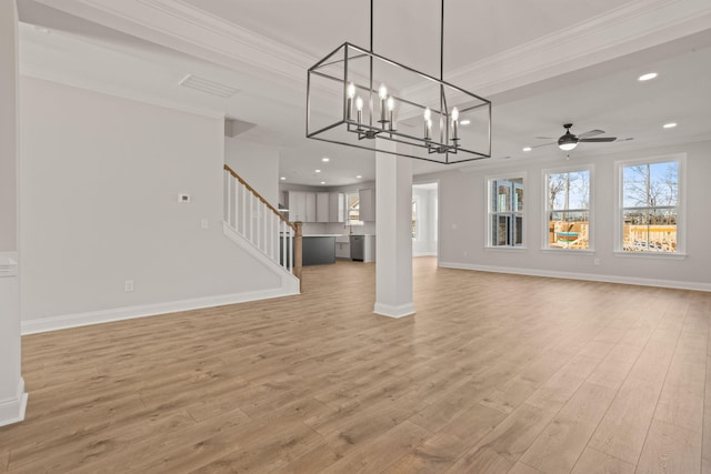 unfurnished living room with light wood-style floors, baseboards, stairway, and ornamental molding