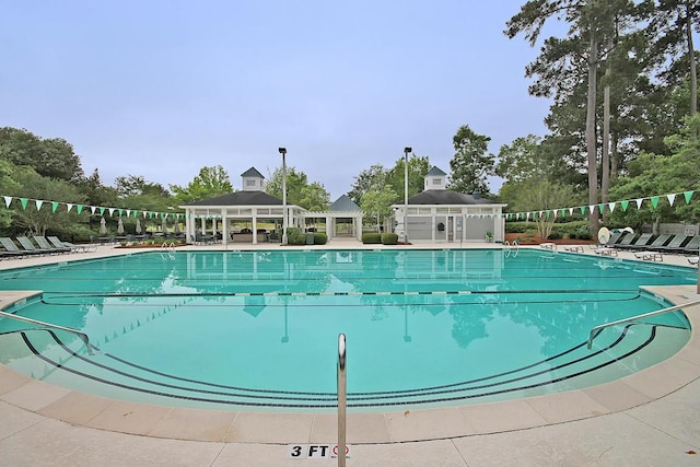 8662 W Fairway Woods Dr, North Charleston, SC 29420 - community pool with a gazebo