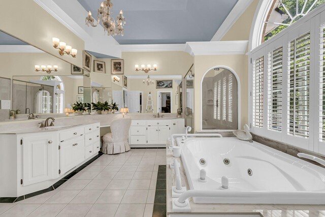 8662 W Fairway Woods Dr, North Charleston, SC 29420 - full bathroom with a chandelier, tile patterned flooring, ornamental molding, a whirlpool tub, and vanity