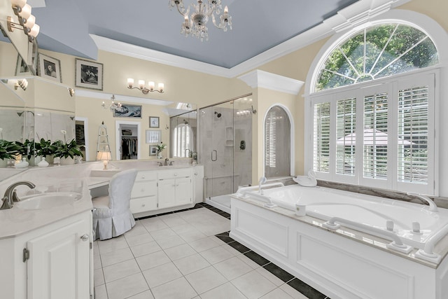 8662 W Fairway Woods Dr, North Charleston, SC 29420 - full bathroom with a chandelier, tile patterned flooring, a garden tub, a stall shower, and double vanity