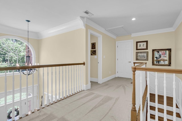 8662 W Fairway Woods Dr, North Charleston, SC 29420 - hall with ornamental molding, an upstairs landing, carpet floors, a chandelier, and attic access