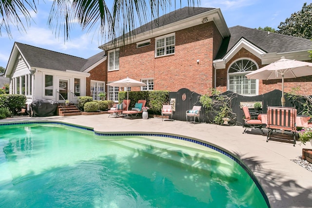 8662 W Fairway Woods Dr, North Charleston, SC 29420 - outdoor pool with a patio area, fence, and entry steps