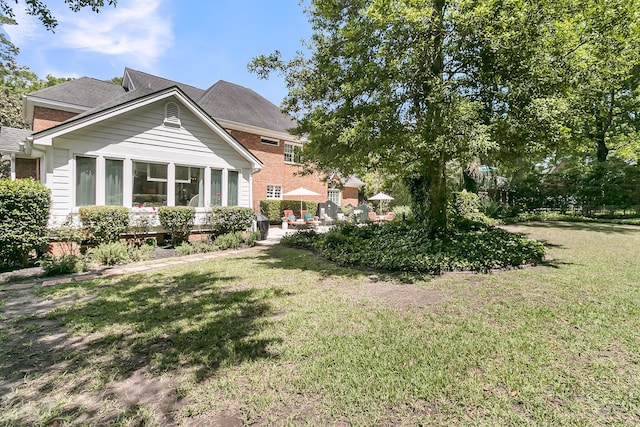 8662 W Fairway Woods Dr, North Charleston, SC 29420 - view of grassy yard
