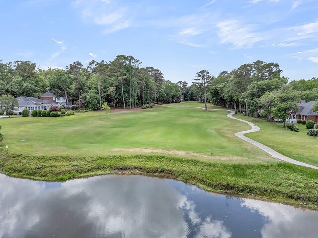 8662 W Fairway Woods Dr, North Charleston, SC 29420 - view of home's community featuring view of wooded area, a lawn, and view of golf course
