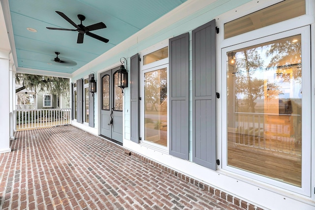 exterior space with a ceiling fan