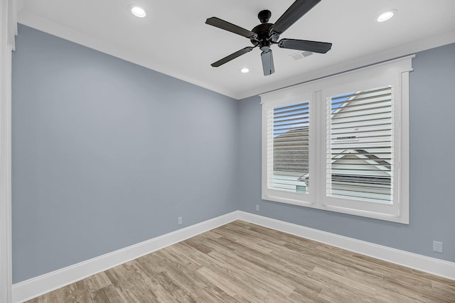 empty room with recessed lighting, a ceiling fan, baseboards, and light wood-type flooring