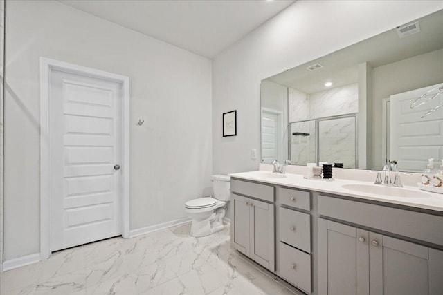 bathroom with marble finish floor, a marble finish shower, toilet, a sink, and baseboards