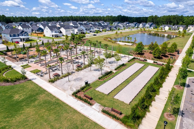 aerial view with a water view and a residential view