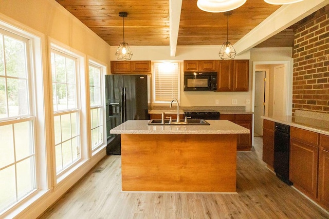 1044 Academy Rd, Walterboro, SC 29488 - kitchen featuring wooden ceiling with exposed beams, black appliances, brown cabinets, a sink, and light wood-style floors