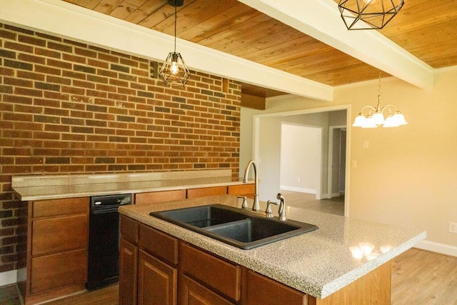1044 Academy Rd, Walterboro, SC 29488 - kitchen with a sink, wood ceiling with exposed beams, an island with sink, brick wall, and baseboards