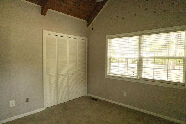 1044 Academy Rd, Walterboro, SC 29488 - unfurnished bedroom with a closet, vaulted ceiling, carpet flooring, and baseboards