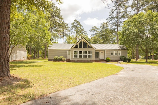 1044 Academy Rd, Walterboro, SC 29488 - single story home with crawl space, driveway, a front lawn, and metal roof