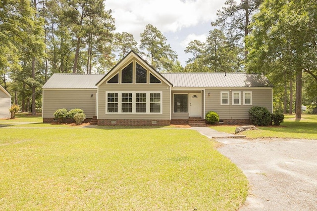 1044 Academy Rd, Walterboro, SC 29488 - view of front of home featuring crawl space, a front yard, and metal roof
