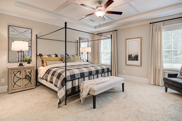 carpeted bedroom featuring ceiling fan, coffered ceiling, and ornamental molding