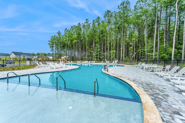 view of pool with a patio