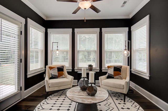 sunroom featuring ceiling fan and a wealth of natural light