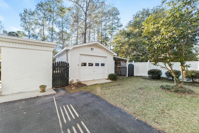 garage with a lawn