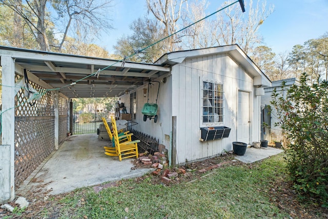 view of home's exterior featuring a carport