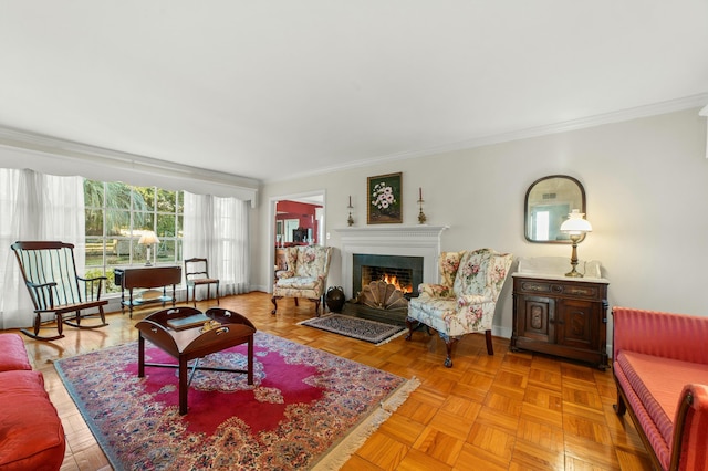 living room featuring light parquet floors and crown molding