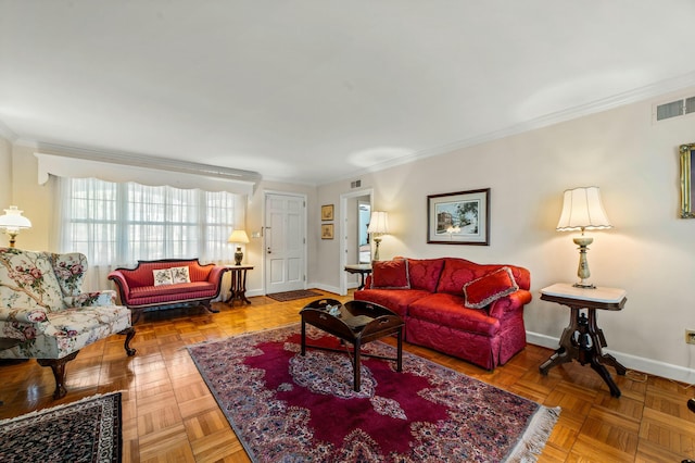 living room with crown molding and parquet floors