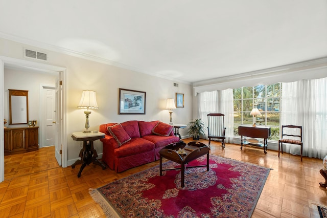 living room with crown molding and parquet floors