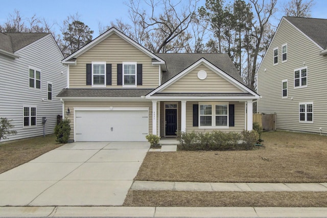 view of front of home featuring a garage and a porch