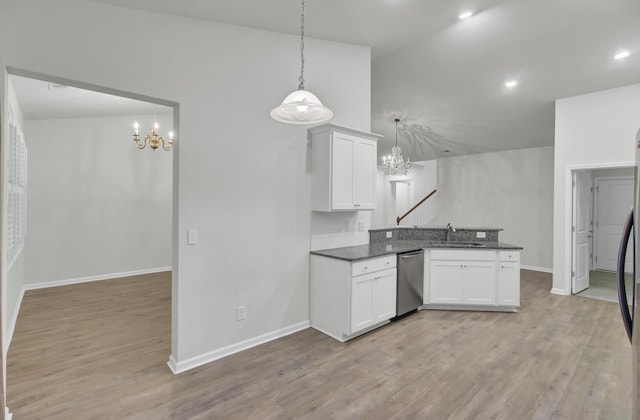 kitchen with white cabinetry, dishwasher, sink, hanging light fixtures, and light hardwood / wood-style floors