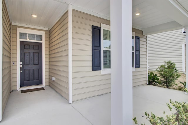 property entrance featuring covered porch