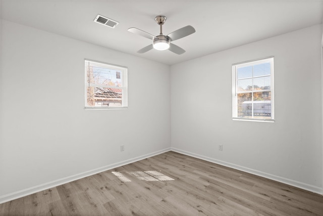 unfurnished room featuring ceiling fan and light hardwood / wood-style floors