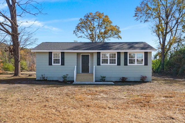 ranch-style house with a front yard